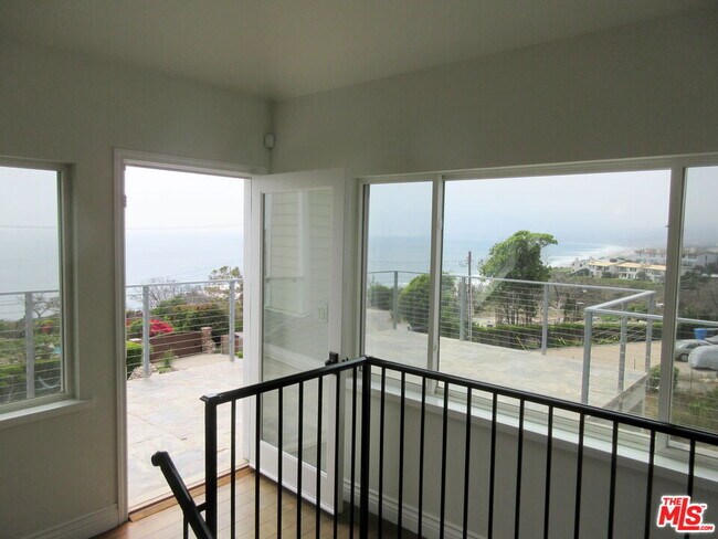 Building Photo - 7012 Birdview Ave