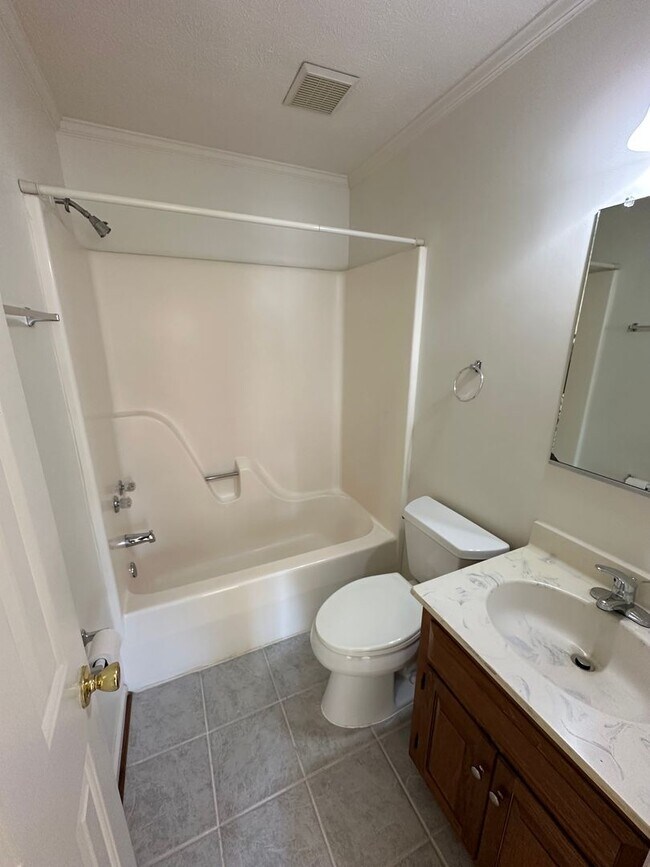 Building Photo - Located in Close Proximity to City Center.