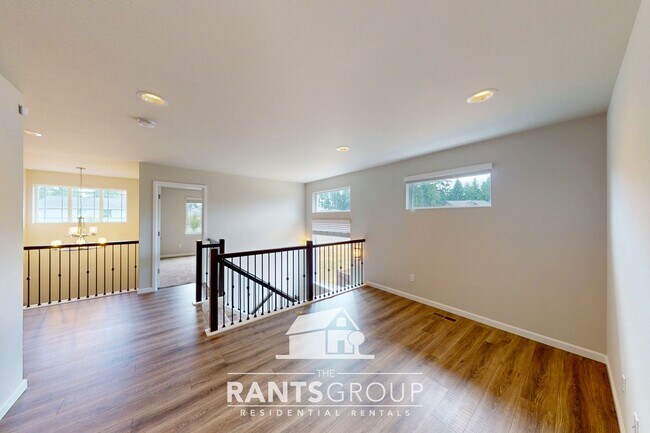 Building Photo - Luxury 4-Bedroom Home with 5-Car Garage & ...