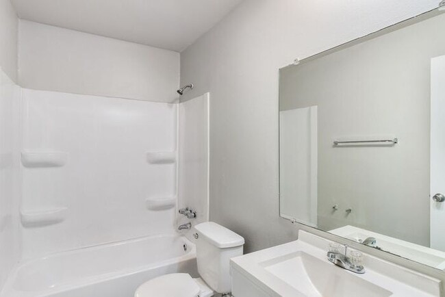 Building Photo - *Beautiful Apartment in Park Like Setting* Updated Shaker Cabinets and Appliances HEAT included