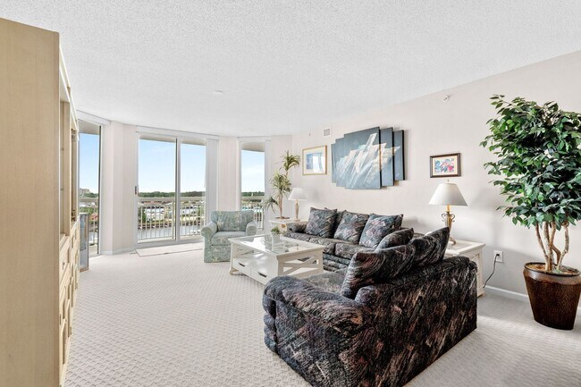 Building Photo - Spacious 3BR/3BA Coastal Retreat at Harbour Pointe – Utilities Included!
