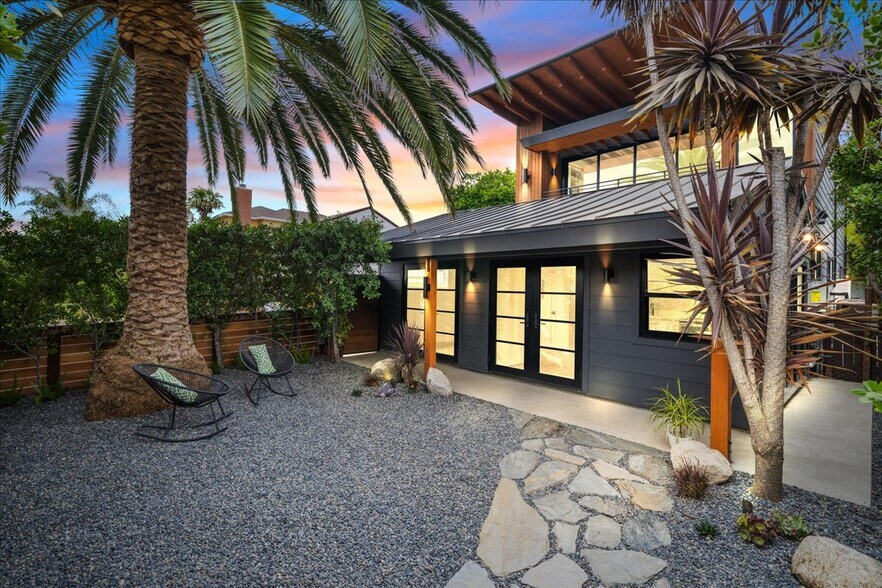 Unit and yard at night - 4027 Moore St