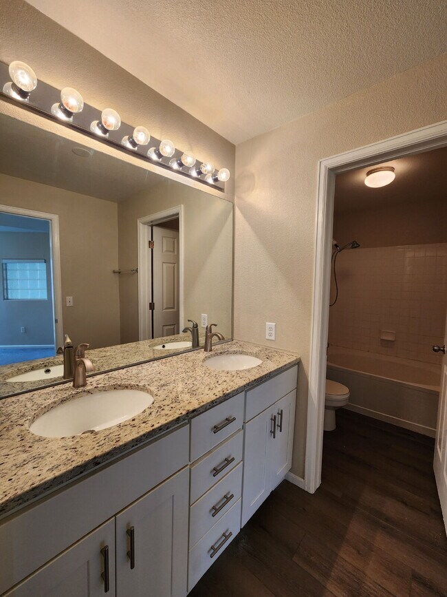 Building Photo - Spacious Two-Suite Townhome With Garage, Fireplace And Community Pool