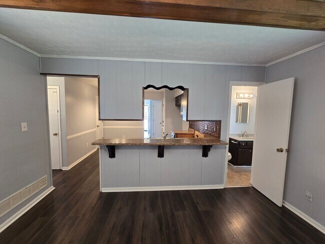 Building Photo - Brick Ranch in the heart of Jeffersontown! Featuring hardwood styled floors, 3 Bedrooms, 1.5 Bath...