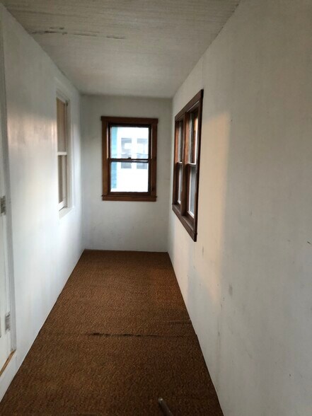 Enclosed 2nd floor porch - 326 Winthrop St