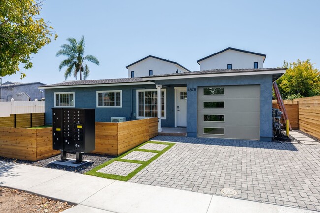 Building Photo - Welcome to your new home in the vibrant Ba...