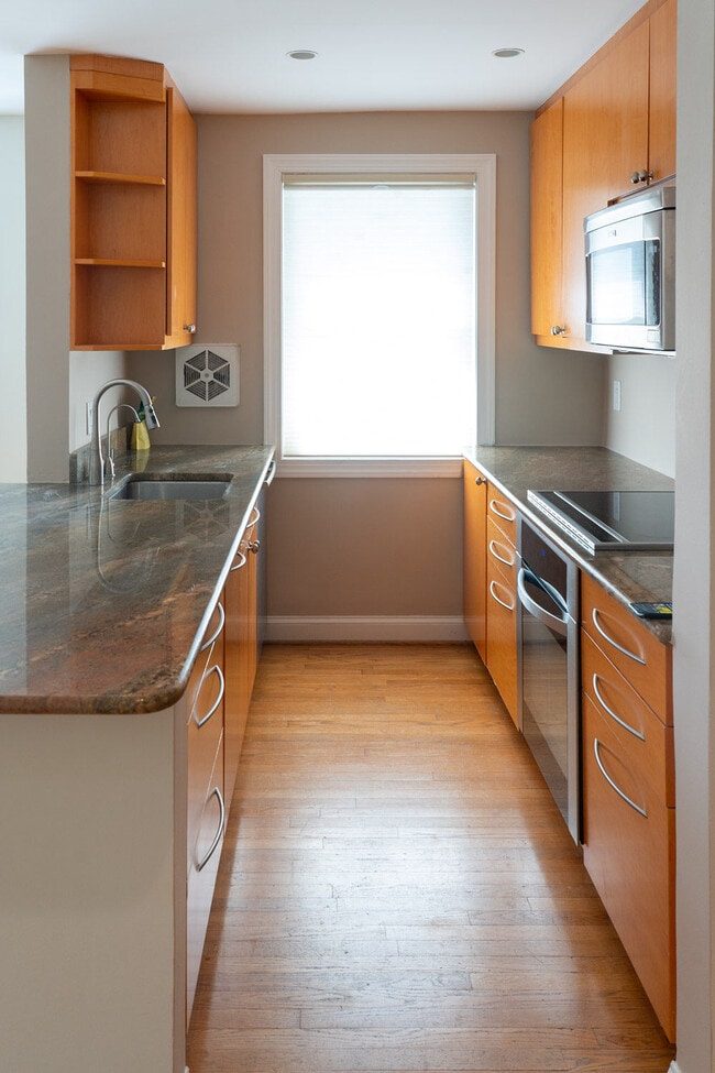 premium granite - 7630 Tomlinson Ave