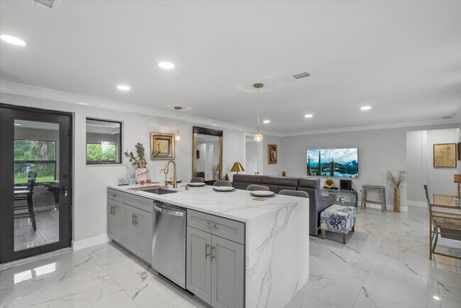 Building Photo - 3-Bedroom Punta Gorda Retreat with Marble Finishes & Stylish Furnishings!"