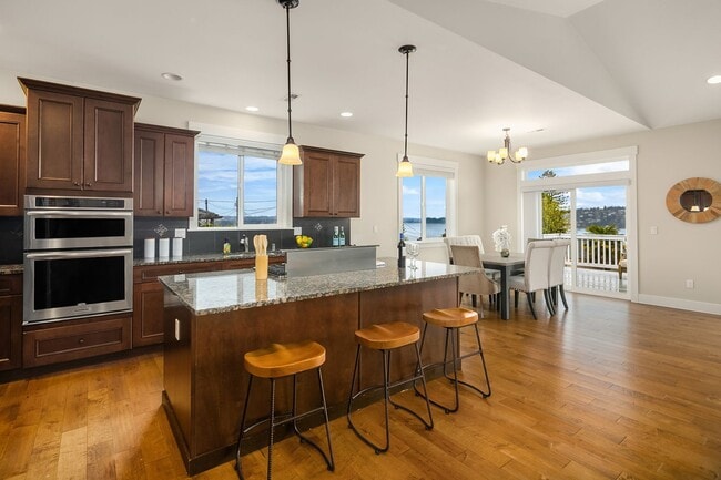 Building Photo - Water Views| Expansive Deck | Flexible Living Spaces