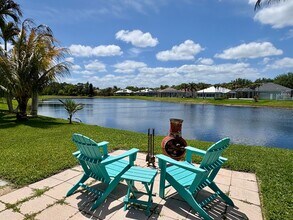 Building Photo - 3/2/2 with huge screened-in lake view patio in The Pines/Jensen Beach