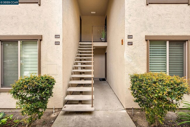 Building Photo - The updated bathroom offers a shower-over-...