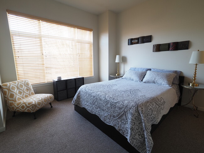 Master Bedroom has a queen bed. - 2408 Main St
