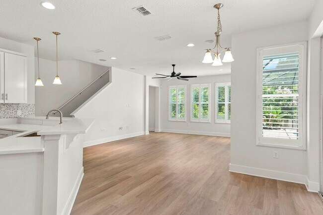 Building Photo - Expansive 4 bedroom, 3 bath remodeled home in gated community