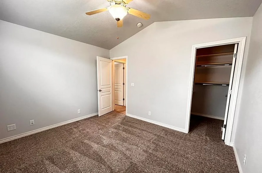 Front Bedroom with walkin closet - 8455 W Harmonica Way