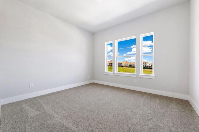 Building Photo - 8208 Bouvreuil Dr
