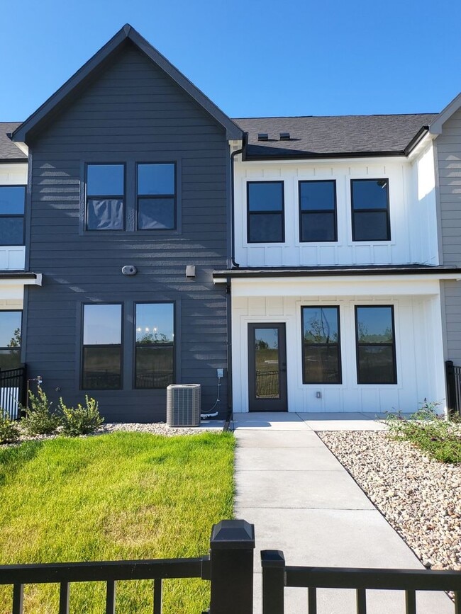 Building Photo - Beautiful New Construction!  3 Bedroom 2.5 Bath Townhome In Sweetgrass!!!!!