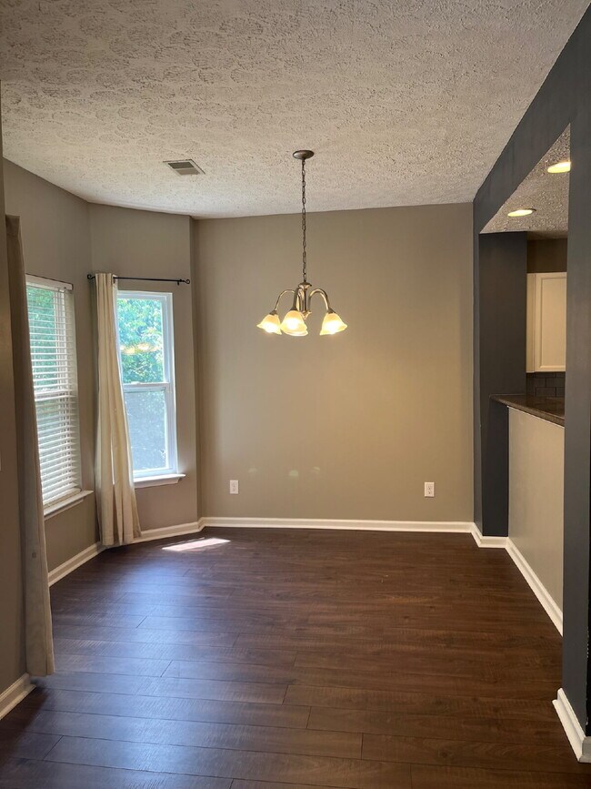 Building Photo - "Spacious 3-Bedroom Townhouse Retreat with Fireplace & Hardwood Floors in Antioch!"