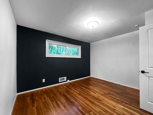 Building Photo - Charming 4BR 2BA w/ Covered Carport • In-Unit Laundry • Front Deck in Chamblee