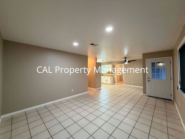 Building Photo - Spacious 4-Bedroom Home with 2-Car Garage & Backyard Oasis