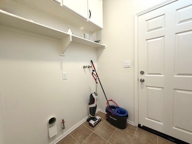 Building Photo - Energy Efficient 5 Bedroom Home with Paid Solar & Covered Patio