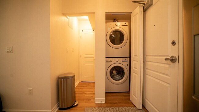 Building Photo - Elevate Your Lifestyle: Luxurious North-Facing Residence with Stunning Courtyard Views