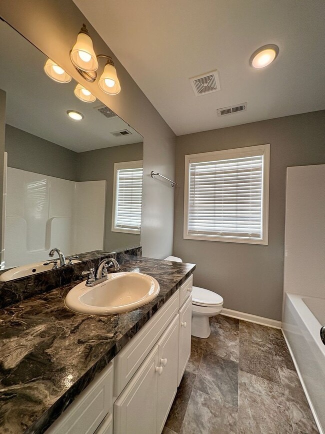 Building Photo - Move-In Ready, Fenced-In Backyard, Pet Friendly, One Story Home – Convenience Meets Comfort!