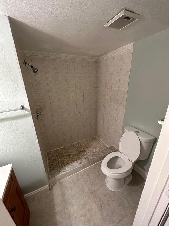 Building Photo - 6031 10th Ave N