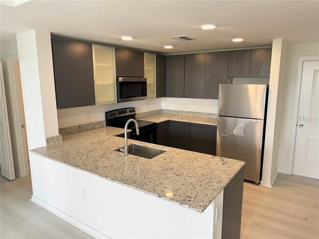 Building Photo - 5579 Millennia Park Dr