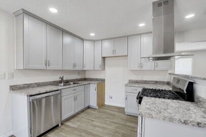 Building Photo - Single story corner home features 3 beds, 2 bathrooms