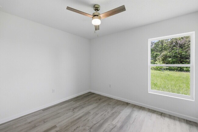 Building Photo - Available Now! New 3/2 Home with Large Backyard and Front Porch