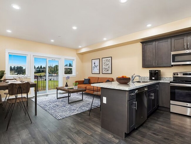 Building Photo - Spacious Two-Bedroom, Two-Bath Living at Marigold Apartments — Available Now