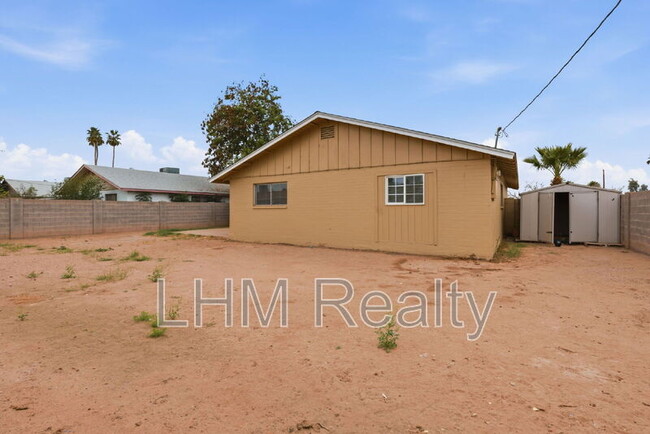 Building Photo - 5321 W Lewis Ave