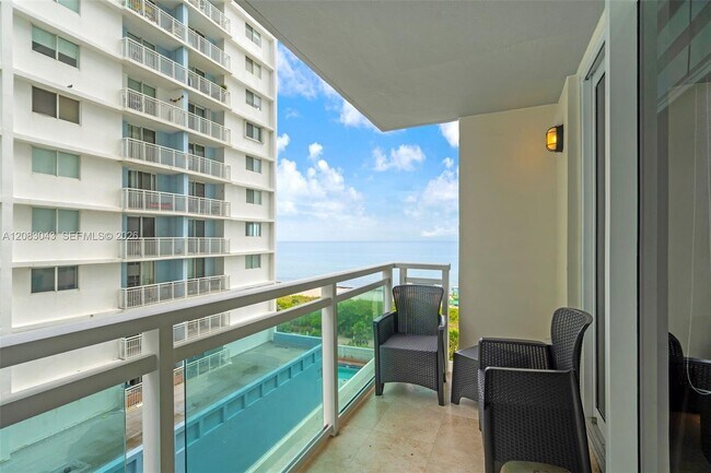 Building Photo - 6917 Collins Ave