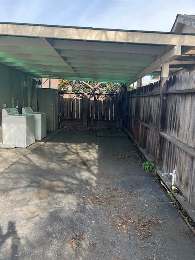 Building Photo - SEPARATE CHARMING COTTAGE / single family house, set off the street, in the back of the property.