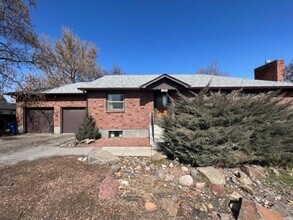 Building Photo - Bi-Level House w/ Massive Backyard, Storage, & Character!