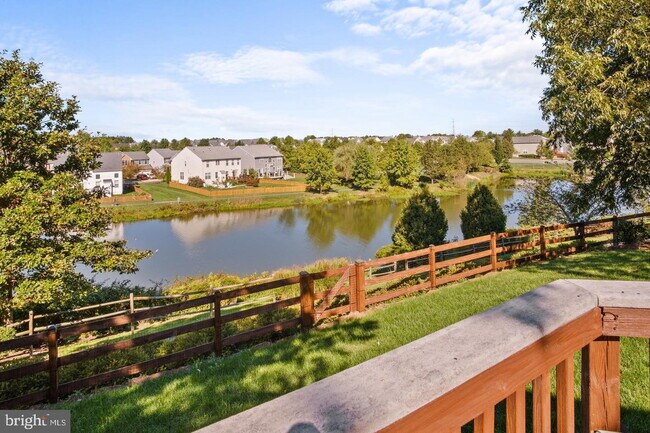 Building Photo - Spacious 4-Bedroom Home with Lake Views & Finished Basement