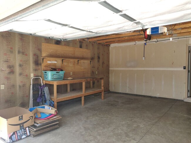 Building Photo - Charming 4-Bedroom Home on 1/2 Acre with a Fenced Backyard, Fully Insulated Double-Car Garage, in...