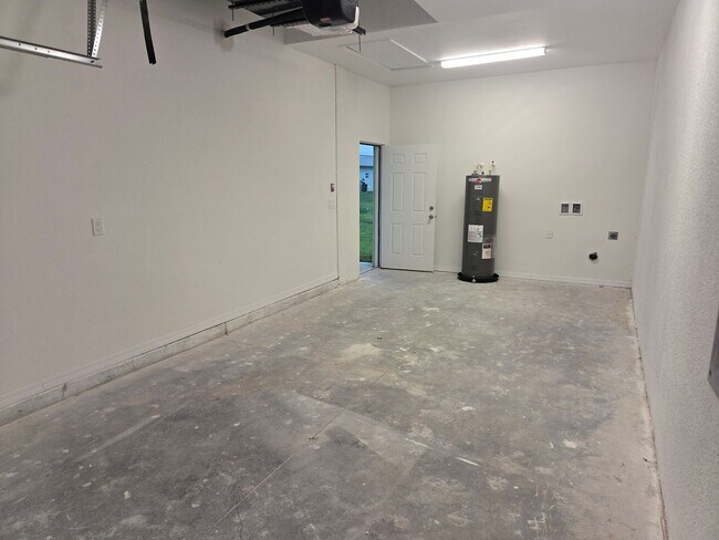 Building Photo - BRAND NEW THREE BEDROOM, 2 BATH, 1 CAR GAR...