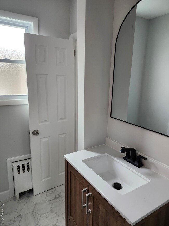 Building Photo - 68-46 Alderton St