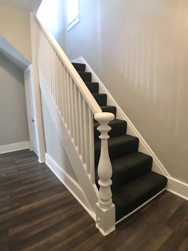 Common entryway. Stairs to upper unit. - 864 Walker St