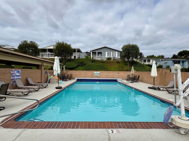 Building Photo - Welcome to the vibrant 55+ mobile home com...