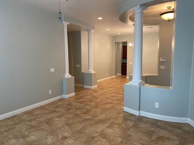 Building Photo - 5-Bed Retreat with Granite Elegance & Cozy Fireplace – 3690 Sq Ft of Comfort in Las Vegas with a ...