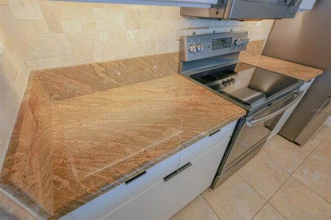 Building Photo - 440 S Gulfview Blvd