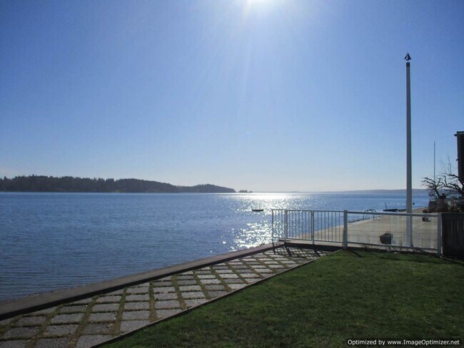Primary Photo - UNIQUE ARTIST-DESIGNED LOW-BANK WATERFRONT...