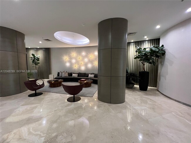 Building Photo - 10275 Collins Ave