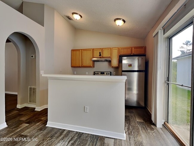 Building Photo - 6637 Gentle Oaks Dr E