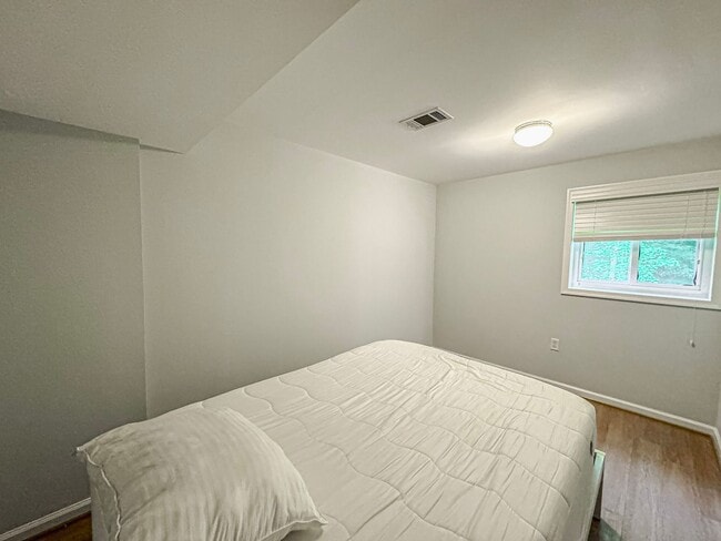 Building Photo - Sought-After 4 Bed 3 Bath L-Shaped Rambler...