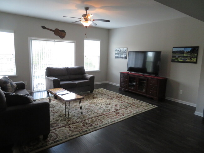 living room with 65" flatscreen - 2112 Middle Tennessee Blvd