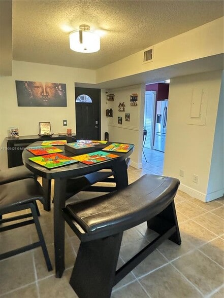 Building Photo - 9986 Royal Palm Blvd