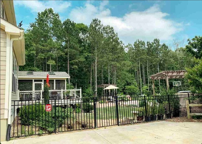Building Photo - Luxurious 4-Bed, 4-Bath Wake Forest Retrea...